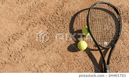 tennis balls black racket. High quality photo tennis balls black racket. High quality photo 84465783