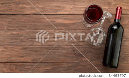 wine bottle wooden background. High quality photo wine bottle wooden background. High quality photo 84465797