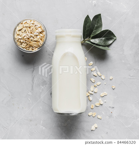 top view milk bottle with oatmeal. High quality photo 84466320