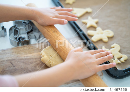 Children's hands making cookies 84467266