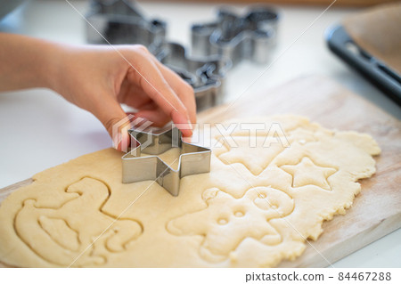 Children's hands making cookies 84467288