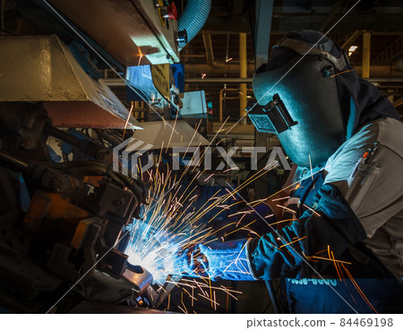 Industrial steel worker speeds motion in factory 84469198