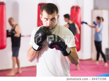 Young man is practicing different kiks Young man is practicing different kiks 84473396