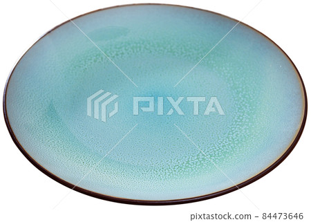 Empty round blue plate on white 84473646