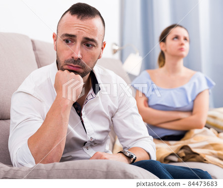 Man is upset because he quarrel with his wife Man is upset because he quarrel with his wife 84473683