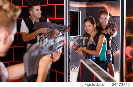 Friendly Laser tag players playing in teams 84473743