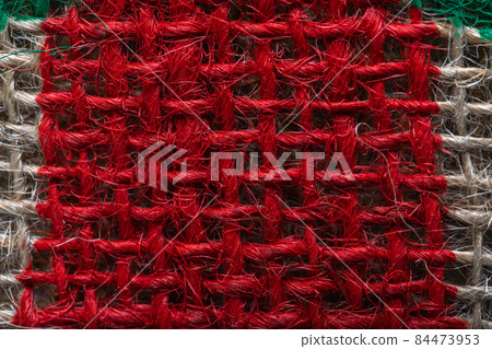Highly detailed photo of red fabric, closeup material texture background. 84473953