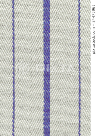 Blue fabric striped texture. Rustic canvas pattern. Colored striped coarse linen fabric closeup as background. Blue fabric striped texture. Rustic canvas pattern. Colored striped coarse linen fabric closeup as background. 84473963