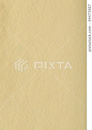 yellow fleecy background. shaggy fiber surface. fine grain felt sunny fabric. texture polyester close-up. 84473987