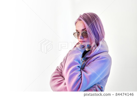 Thoughtful stylish woman with bright dyed hair 84474146