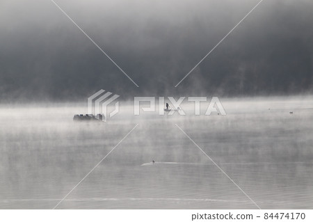 People who enjoy boat fishing at Haji Dam lake in late autumn People who enjoy boat fishing at Haji Dam lake in late autumn 84474170