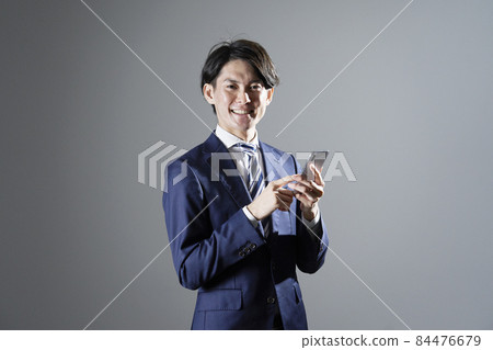 商人智能手機灰色背景 84476679