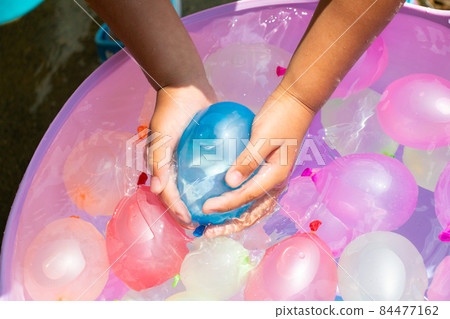 A refreshing image with beautiful colorful and POP water balloons A refreshing image with beautiful colorful and POP water balloons 84477162