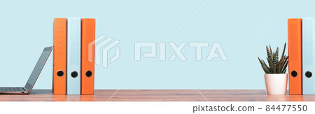 Colorful document binders or lever arch file on a shelf or desk banner Colorful document binders or lever arch file on a shelf or desk banner 84477550
