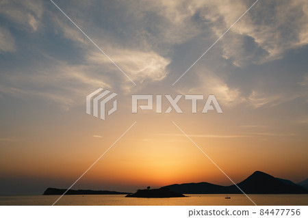 Beautiful orange sunset over Mamula island. Montenegro Beautiful orange sunset over Mamula island. Montenegro 84477756
