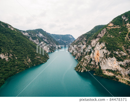 Green canyon along Lake Piva in Montenegro. Drone Green canyon along Lake Piva in Montenegro. Drone 84478371