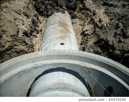 Precast concrete manhole with pass through pipe connections 84478590
