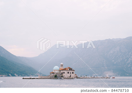 Church of Our Lady on the rocks on the island of Gospa od Skrpjela. Montenegro Church of Our Lady on the rocks on the island of Gospa od Skrpjela. Montenegro 84478710