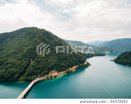 Bridge and road along Lake Piva. Montenegro. Drone Bridge and road along Lake Piva. Montenegro. Drone 84478892