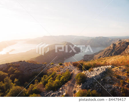 Rocky mountains in the sun over the Kotor Bay. Mount Lovcen Rocky mountains in the sun over the Kotor Bay. Mount Lovcen 84479417