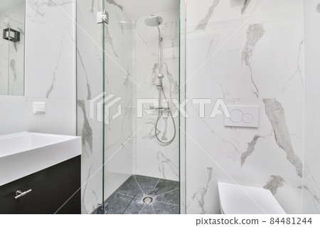 Eegant bright bathroom with toilet and shower Eegant bright bathroom with toilet and shower 84481244
