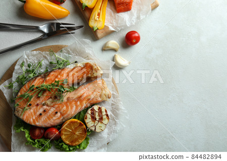 Concept of tasty eating with grilled salmon, space for text 84482894