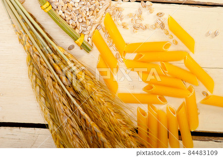 Italian pasta penne with wheat Italian pasta penne with wheat 84483109