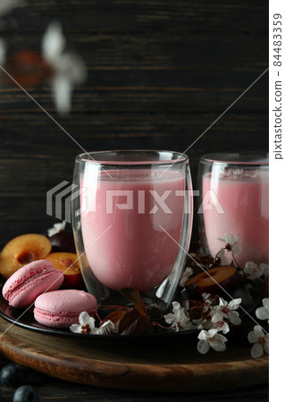 Concept of sweet eating on wooden background Concept of sweet eating on wooden background 84483359