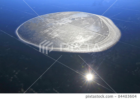 A shape created by crystals of salt in a salt field 84483604