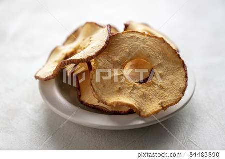Dried apple rings. Homemade organic delicious healthy snack. Dried apple rings. Homemade organic delicious healthy snack. 84483890