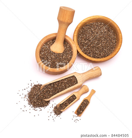 Wooden scoop of organic natural chia seeds close-up isolated on white background Wooden scoop of organic natural chia seeds close-up isolated on white background 84484505