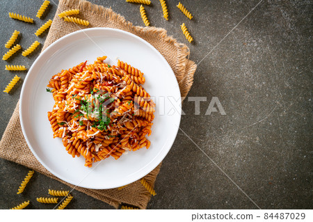 spirali or spiral pasta with tomato sauce spirali or spiral pasta with tomato sauce 84487029