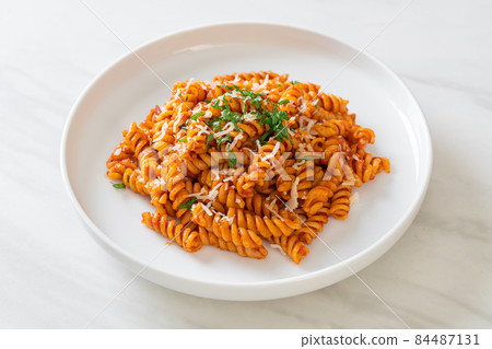 spirali or spiral pasta with tomato sauce spirali or spiral pasta with tomato sauce 84487131