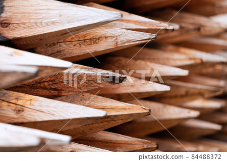 Freshly chopped wooden stakes (Selective focus) Freshly chopped wooden stakes (Selective focus) 84488372