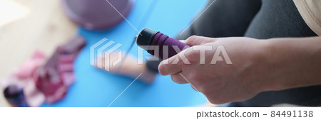 In women hands rope for sports closeup 84491138
