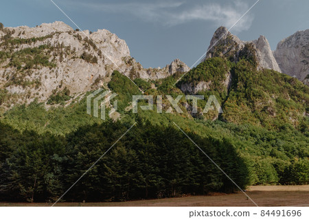 A view of the accursed mountains in the Grebaje Valley. Prokletije, also known as the Albanian Alps and the Accursed Mountains, is a mountain range on the Balkan peninsula, extending from northern A view of the accursed mountains in the Grebaje Valley. Prokletije, also known as the Albanian Alps and the Accursed Mountains, is a mountain range on the Balkan peninsula, extending from northern 84491696