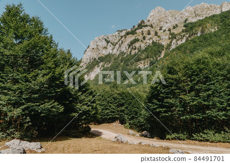 A view of the accursed mountains in the Grebaje Valley. Prokletije, also known as the Albanian Alps and the Accursed Mountains, is a mountain range on the Balkan peninsula, extending from northern A view of the accursed mountains in the Grebaje Valley. Prokletije, also known as the Albanian Alps and the Accursed Mountains, is a mountain range on the Balkan peninsula, extending from northern 84491701