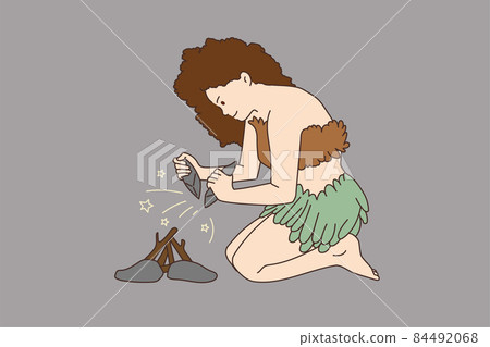 Ancient woman or girl get fire from rocks Ancient woman or girl get fire from rocks 84492068