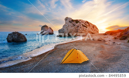Orange tourist tent on the beach of Aphrodite in Cyprus Orange tourist tent on the beach of Aphrodite in Cyprus 84495859