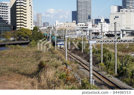 Takashima Line freight train EF210 type seen from Takashima Suisaisen Park 84496553