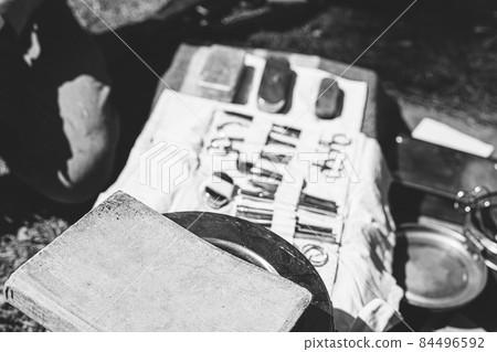 Old Medical And Surgical Instruments. Many Surgical Instruments For Surgery. Old Different Metal Medical Instruments Objects. Retro Stainless Surgical Equipment Tools. Black And White Toned Shot. 84496592