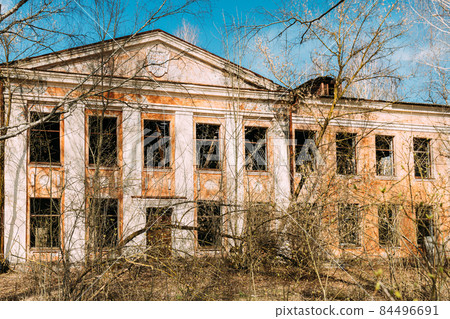 Abandoned Ruined Old School Building In Chernobyl Resettlement Zone. Belarus. Chornobyl Catastrophe Disasters. Dilapidated House In Belarusian Village. Whole Villages Must Be Disposed. Radioactivity 84496691