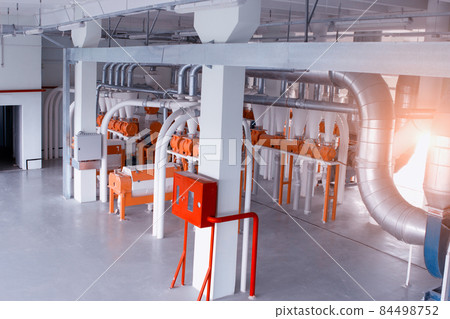 Modern workshop at the plant for the production of food flour from grain, production breadstuffs Modern workshop at the plant for the production of food flour from grain, production breadstuffs 84498752