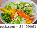 Sliced leeks, peppers and spring onions 84499061