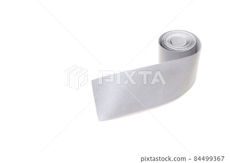 A roll of reflective tape on a white background, close-up, isolate, visibility, light reflection tape, equipment A roll of reflective tape on a white background, close-up, isolate, visibility, light reflection tape, equipment 84499367