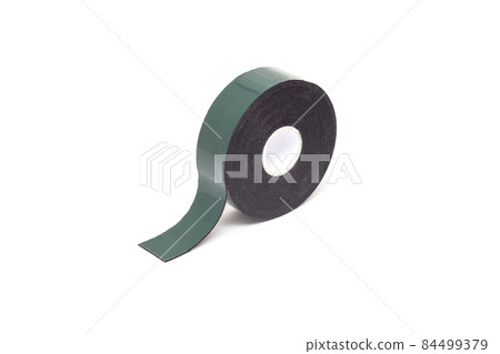 Reel of double-sided tape on a white background, isolate, green double-sided tape, close-up, material Reel of double-sided tape on a white background, isolate, green double-sided tape, close-up, material 84499379