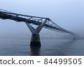 Millennium Bridge disappearing in the fog 84499505