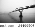 Millennium Bridge disappearing in the fog 84499506