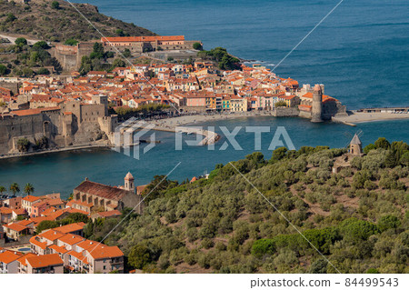 The amazing aerial view over Collioure from Fort Saint Elme surrounded by vineyards, Vermeille coast 84499543