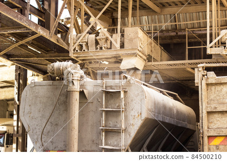 Loading of mixed fodder in a truck for feeding farm animals, a factory for the production of mixed fodder, factory 84500210